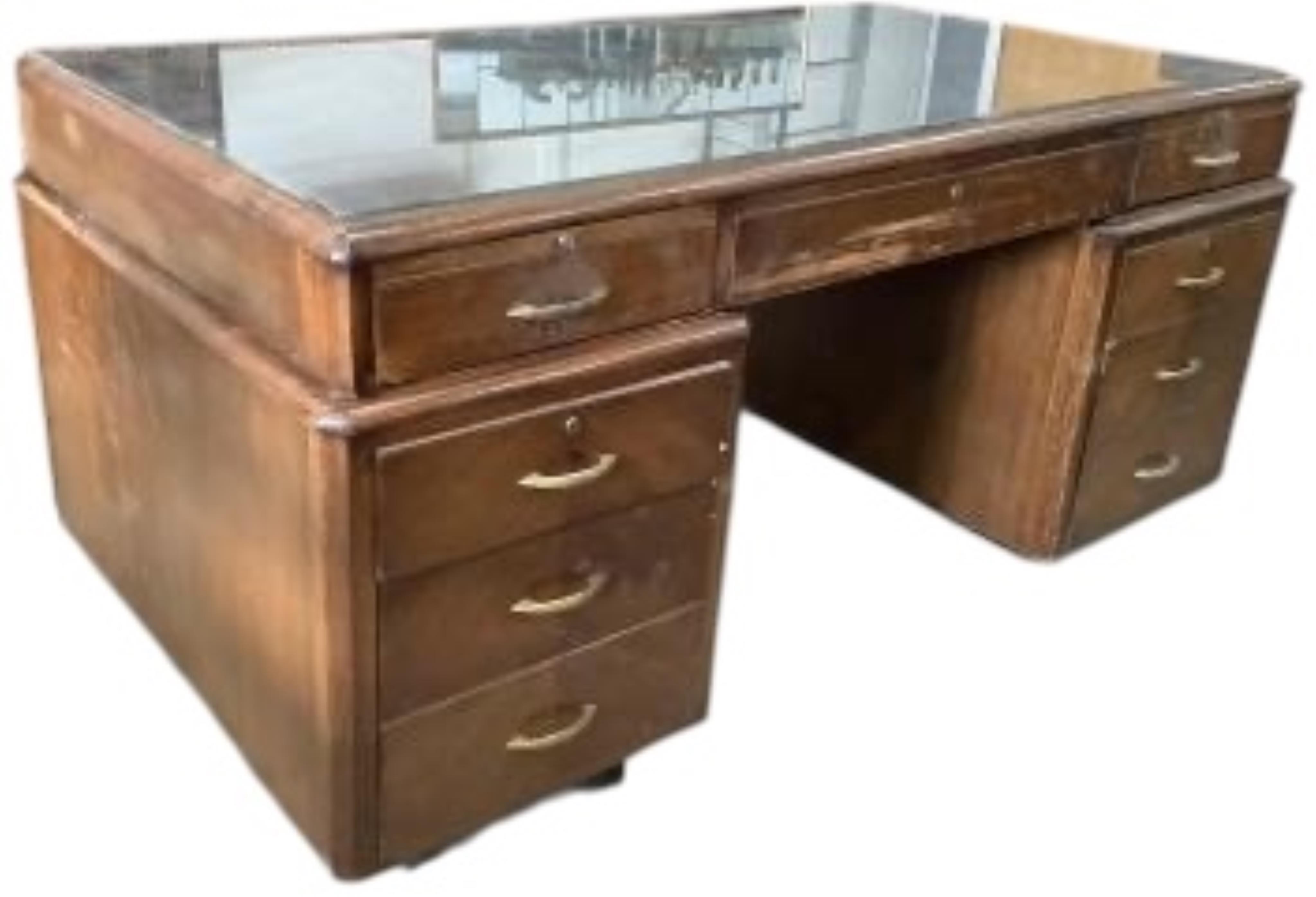 An early 20th century Continental oak pedestal desk, width 165cm, depth 94cm, height 78cm